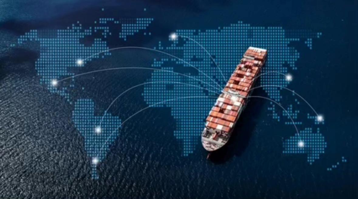 A container ship at sea with global shipping routes drawn over a world map